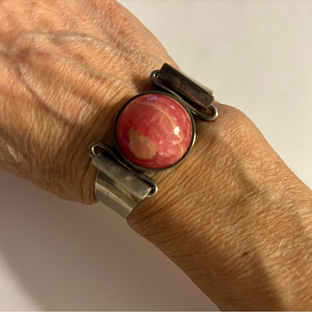 Beautiful handcrafted sterling silver and rhodochrosite bracelet.